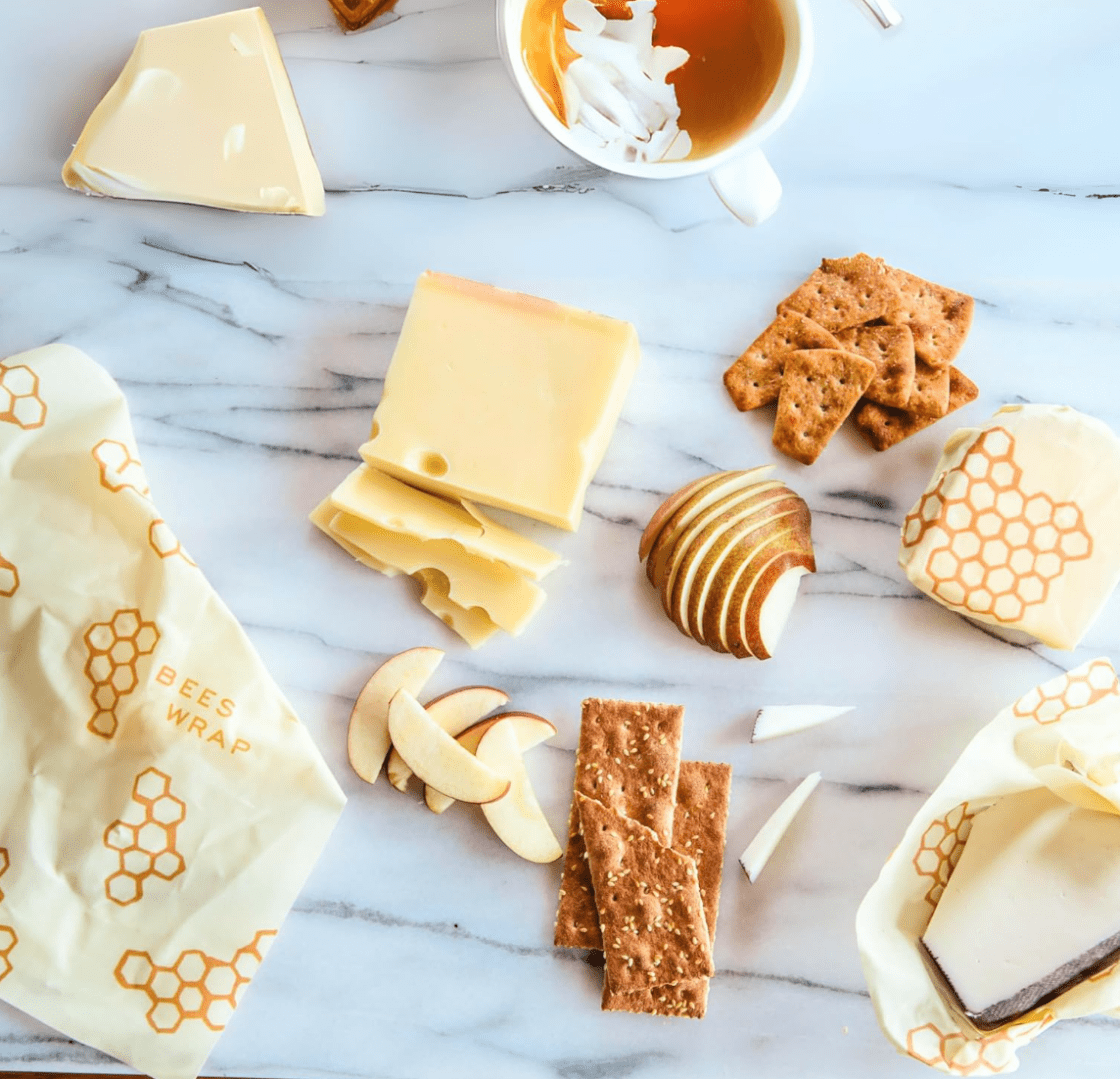 image of various food wrapped and unwrapped in beeswax reusable wrap Kitchen gadget gifts